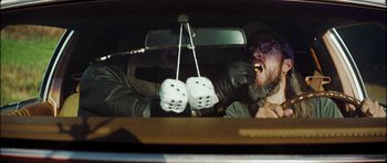 Movie still from “J Travis - Albatross” (2019), directed by Ft. Langley – Close Up shot, Low angle