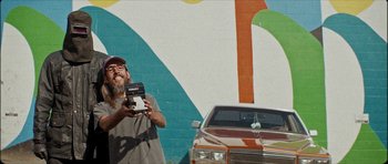 Movie still from “J Travis - Albatross” (2019), directed by Ft. Langley – Medium shot, Low angle