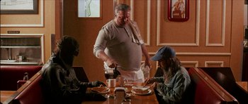 Movie still from “J Travis - Albatross” (2019), directed by Ft. Langley – Medium shot, Over the shoulder angle