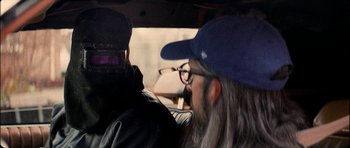 Movie still from “J Travis - Albatross” (2019), directed by Ft. Langley – Close Up shot, Over the shoulder angle