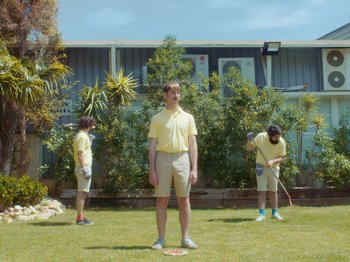 Movie still from “Colectivo Da Silva - Marina d’Or” (2019), directed by Kirkpatrick Buffet – Wide shot, Low angle