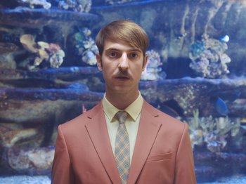 Movie still from “Colectivo Da Silva - Marina d’Or” (2019), directed by Kirkpatrick Buffet – Medium shot, High angle