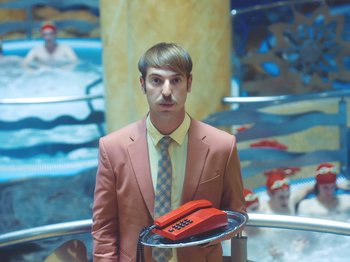 Movie still from “Colectivo Da Silva - Marina d’Or” (2019), directed by Kirkpatrick Buffet – Medium shot, Overhead angle