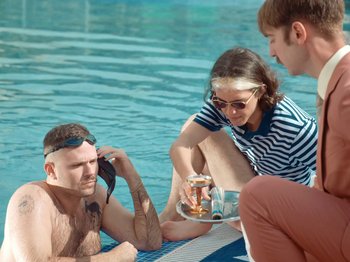 Movie still from “Colectivo Da Silva - Marina d’Or” (2019), directed by Kirkpatrick Buffet – Medium shot, High angle