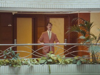 Movie still from “Colectivo Da Silva - Marina d’Or” (2019), directed by Kirkpatrick Buffet – Wide shot, Low angle