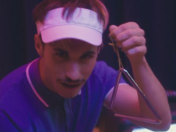 Movie still from “Colectivo Da Silva - Marina d’Or” (2019), directed by Kirkpatrick Buffet – Close Up shot, Low angle