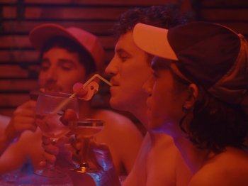 Movie still from “Colectivo Da Silva - Marina d’Or” (2019), directed by Kirkpatrick Buffet – Medium shot, High angle