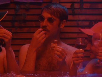 Movie still from “Colectivo Da Silva - Marina d’Or” (2019), directed by Kirkpatrick Buffet – Medium shot, High angle