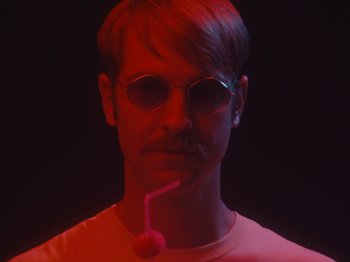 Movie still from “Colectivo Da Silva - Marina d’Or” (2019), directed by Kirkpatrick Buffet – Close Up shot, Low angle
