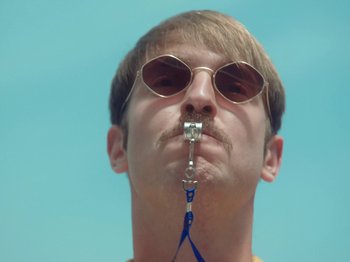 Movie still from “Colectivo Da Silva - Marina d’Or” (2019), directed by Kirkpatrick Buffet – Extreme Close Up shot, Low angle