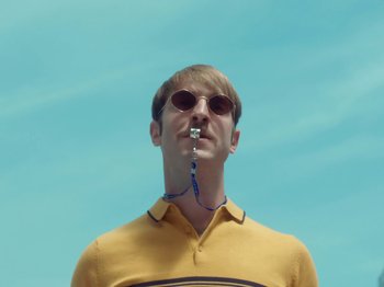 Movie still from “Colectivo Da Silva - Marina d’Or” (2019), directed by Kirkpatrick Buffet – Close Up shot, Low angle