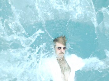 Movie still from “Colectivo Da Silva - Marina d’Or” (2019), directed by Kirkpatrick Buffet – Wide shot, Overhead angle