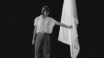 Movie still from “De Staat - Tie Me Down feat. Luwten” (2019), directed by Ruben Van Leer – Medium shot, Low angle