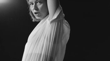 Movie still from “De Staat - Tie Me Down feat. Luwten” (2019), directed by Ruben Van Leer – Medium shot, Low angle
