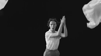 Movie still from “De Staat - Tie Me Down feat. Luwten” (2019), directed by Ruben Van Leer – Medium shot, Low angle