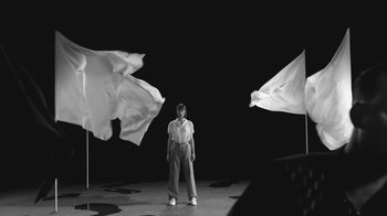Movie still from “De Staat - Tie Me Down feat. Luwten” (2019), directed by Ruben Van Leer – Wide shot, Low angle