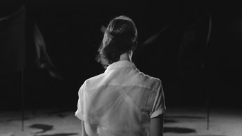 Movie still from “De Staat - Tie Me Down feat. Luwten” (2019), directed by Ruben Van Leer – Medium shot, Low angle