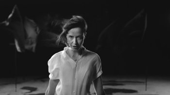 Movie still from “De Staat - Tie Me Down feat. Luwten” (2019), directed by Ruben Van Leer – Medium shot, Low angle