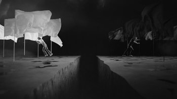 Movie still from “De Staat - Tie Me Down feat. Luwten” (2019), directed by Ruben Van Leer – Extreme Wide shot, Overhead angle