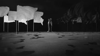 Movie still from “De Staat - Tie Me Down feat. Luwten” (2019), directed by Ruben Van Leer – Extreme Wide shot, Low angle