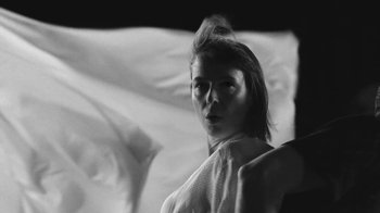 Movie still from “De Staat - Tie Me Down feat. Luwten” (2019), directed by Ruben Van Leer – Close Up shot, Low angle