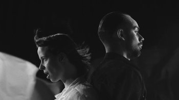 Movie still from “De Staat - Tie Me Down feat. Luwten” (2019), directed by Ruben Van Leer – Close Up shot, Low angle