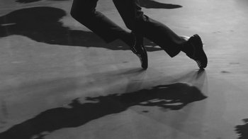 Movie still from “De Staat - Tie Me Down feat. Luwten” (2019), directed by Ruben Van Leer – Extreme Close Up shot, High angle