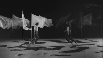 Movie still from “De Staat - Tie Me Down feat. Luwten” (2019), directed by Ruben Van Leer – Wide shot, Low angle