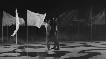 Movie still from “De Staat - Tie Me Down feat. Luwten” (2019), directed by Ruben Van Leer – Wide shot, Low angle