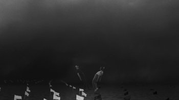 Movie still from “De Staat - Tie Me Down feat. Luwten” (2019), directed by Ruben Van Leer – Extreme Wide shot, Low angle