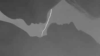 Movie still from “De Staat - Tie Me Down feat. Luwten” (2019), directed by Ruben Van Leer – Extreme Close Up shot, Overhead angle