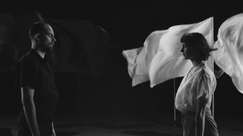 Movie still from “De Staat - Tie Me Down feat. Luwten” (2019), directed by Ruben Van Leer – Medium shot, Low angle