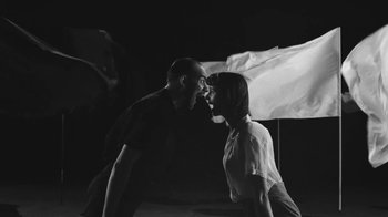 Movie still from “De Staat - Tie Me Down feat. Luwten” (2019), directed by Ruben Van Leer – Medium shot, Low angle