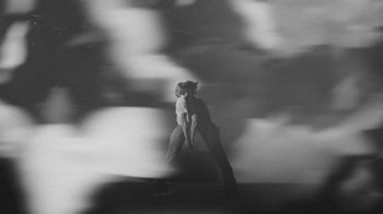 Movie still from “De Staat - Tie Me Down feat. Luwten” (2019), directed by Ruben Van Leer – Wide shot, Low angle