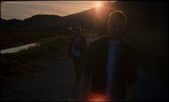 Movie still from “Premiere_ Jordan Klassen - Virtuous Circle” (2019), directed by Farhad Ghaderi – Wide shot, Low angle