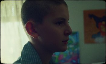 Movie still from “Premiere_ Jordan Klassen - Virtuous Circle” (2019), directed by Farhad Ghaderi – Close Up shot, Low angle