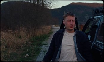 Movie still from “Premiere_ Jordan Klassen - Virtuous Circle” (2019), directed by Farhad Ghaderi – Medium shot, Low angle