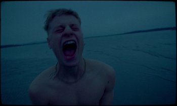 Movie still from “Premiere_ Jordan Klassen - Virtuous Circle” (2019), directed by Farhad Ghaderi – Close Up shot, High angle