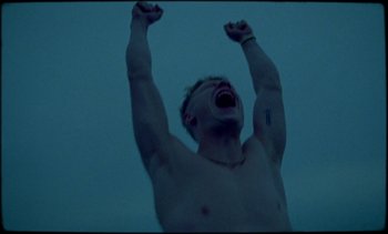 Movie still from “Premiere_ Jordan Klassen - Virtuous Circle” (2019), directed by Farhad Ghaderi – Close Up shot, Low angle