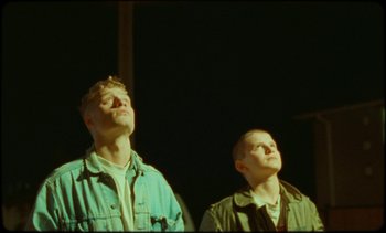 Movie still from “Premiere_ Jordan Klassen - Virtuous Circle” (2019), directed by Farhad Ghaderi – Medium shot, Low angle