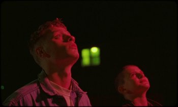 Movie still from “Premiere_ Jordan Klassen - Virtuous Circle” (2019), directed by Farhad Ghaderi – Medium shot, Low angle