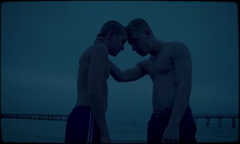 Movie still from “Premiere_ Jordan Klassen - Virtuous Circle” (2019), directed by Farhad Ghaderi – Medium shot, Low angle