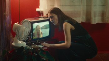 Movie still from “Purple Pilgrims - Two Worlds Apart” (2019), directed by W.A.M Bleakley – Medium shot, Over the shoulder angle