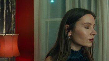 Movie still from “Purple Pilgrims - Two Worlds Apart” (2019), directed by W.A.M Bleakley – Close Up shot, Over the shoulder angle