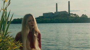 Movie still from “Purple Pilgrims - Two Worlds Apart” (2019), directed by W.A.M Bleakley – Medium shot, Over the shoulder angle