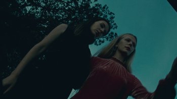 Movie still from “Purple Pilgrims - Two Worlds Apart” (2019), directed by W.A.M Bleakley – Medium shot, Low angle