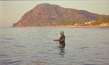 Movie still from “Loving - Nihilist Kite Flyer” (2019), directed by Ft. Langley – Extreme Wide shot, Low angle