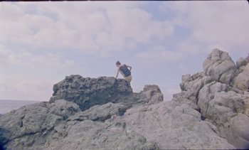 Movie still from “Loving - Nihilist Kite Flyer” (2019), directed by Ft. Langley – Extreme Wide shot, Low angle