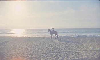Movie still from “Loving - Nihilist Kite Flyer” (2019), directed by Ft. Langley – Extreme Wide shot, Low angle