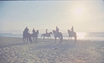 Movie still from “Loving - Nihilist Kite Flyer” (2019), directed by Ft. Langley – Extreme Wide shot, Low angle